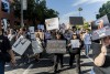 Protester line the downtown streets of Riverside Ca as thousands come out to protest under the banner no Kings on June 14