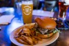 Comedians perform at a brewery in Riverside Ca on June 14